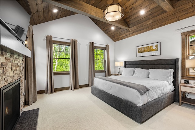 3 Gardenia Dr Unit M6, Richmond, RI 02898 - bedroom featuring wooden ceiling with exposed beams, light colored carpet, a stone fireplace, recessed lighting, and baseboards
