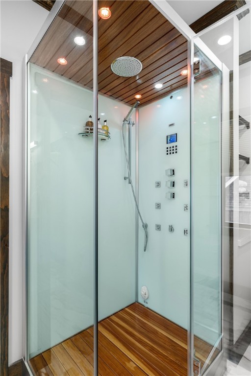 3 Gardenia Dr Unit M6, Richmond, RI 02898 - bathroom with a shower stall, elevator, and wood finished floors