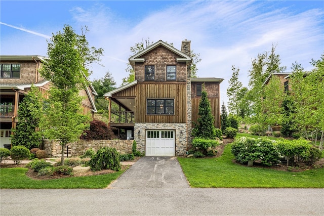 3 Gardenia Dr Unit M6, Richmond, RI 02898 - rustic home with a chimney, an attached garage, driveway, a balcony, and stone siding