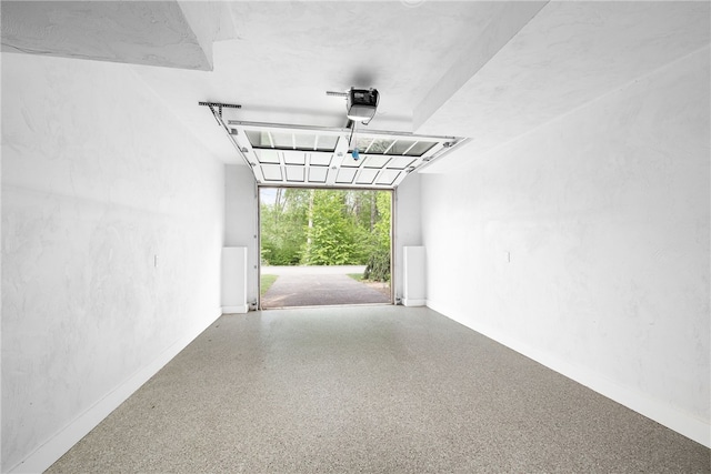 3 Gardenia Dr Unit M6, Richmond, RI 02898 - garage featuring a garage door opener