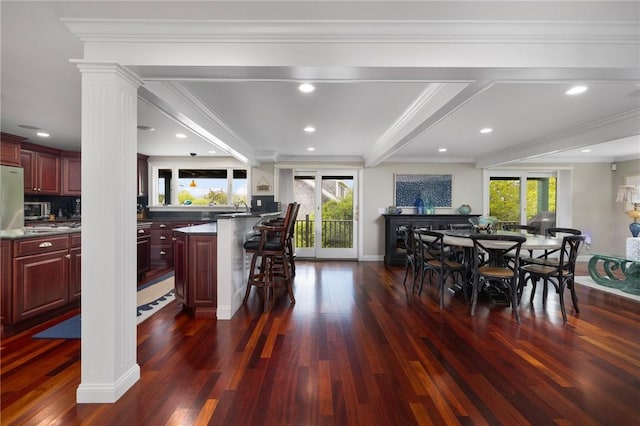 129 Sand Hill Cove Rd, Narragansett, RI 02882 - dining space featuring dark wood-type flooring, plenty of natural light, crown molding, recessed lighting, and baseboards