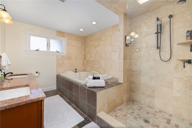 129 Sand Hill Cove Rd, Narragansett, RI 02882 - bathroom with a garden tub, tiled shower, baseboards, double vanity, and tile patterned floors