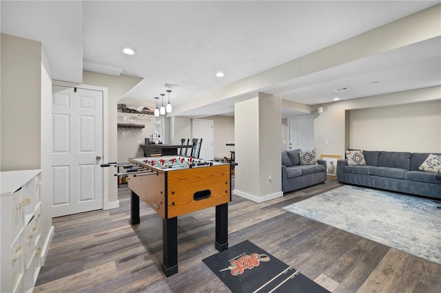 129 Sand Hill Cove Rd, Narragansett, RI 02882 - rec room with dark wood-style floors, baseboards, and recessed lighting