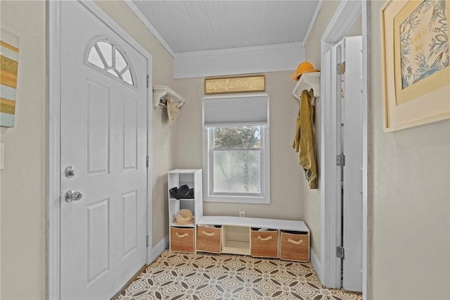47 Cliff St, East Greenwich, RI 02818 - mudroom with ornamental molding, light tile patterned floors, and baseboards