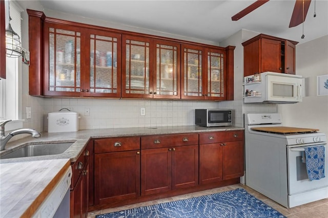 47 Cliff St, East Greenwich, RI 02818 - kitchen with white appliances, a sink, ceiling fan, and reddish brown cabinets