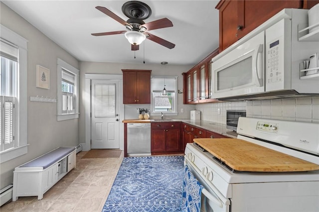 47 Cliff St, East Greenwich, RI 02818 - kitchen featuring white appliances, a sink, plenty of natural light, and a ceiling fan