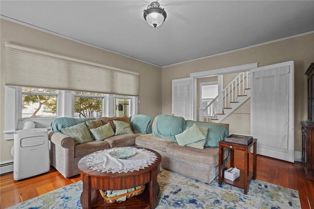 47 Cliff St, East Greenwich, RI 02818 - living room featuring wood finished floors, stairway, ornamental molding, and baseboard heating