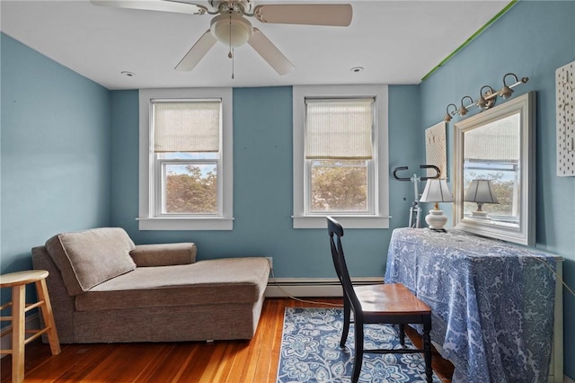 47 Cliff St, East Greenwich, RI 02818 - home office featuring a baseboard radiator, wood finished floors, healthy amount of natural light, and ceiling fan