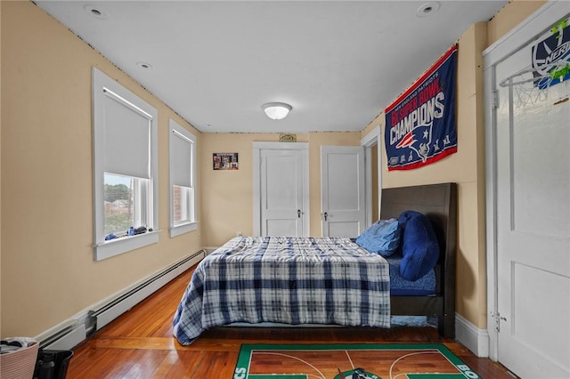 47 Cliff St, East Greenwich, RI 02818 - bedroom featuring wood finished floors and baseboards