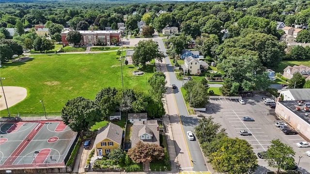 47 Cliff St, East Greenwich, RI 02818 - aerial perspective of suburban area featuring a heavily wooded area