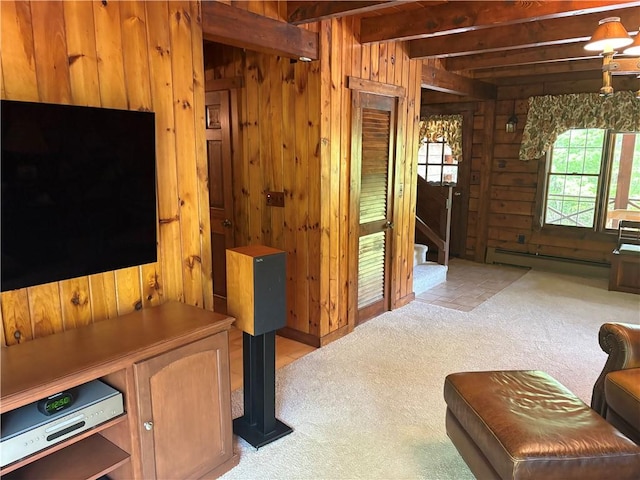 85 Plainfield Pike, Foster, RI 02825 - living room with a baseboard radiator, wood walls, light carpet, beamed ceiling, and stairs