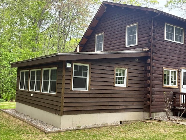 85 Plainfield Pike, Foster, RI 02825 - view of home's exterior featuring log siding