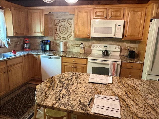 85 Plainfield Pike, Foster, RI 02825 - kitchen with white appliances, light stone countertops, decorative backsplash, and a sink
