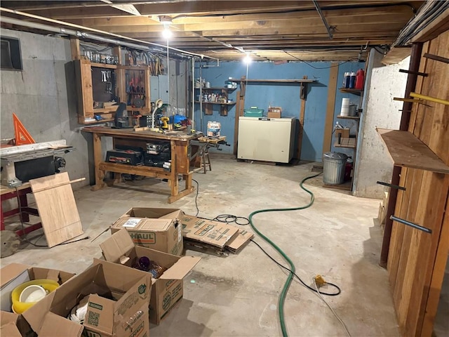 85 Plainfield Pike, Foster, RI 02825 - unfinished basement with a workshop area and washer / clothes dryer
