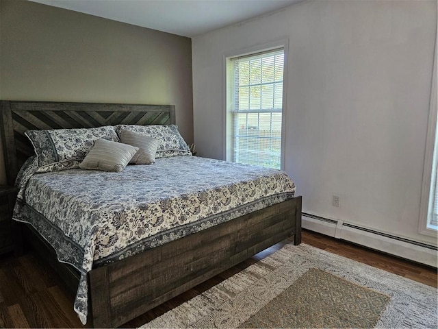 54 Polk Rd, Warwick, RI 02889 - bedroom featuring wood finished floors and a baseboard radiator