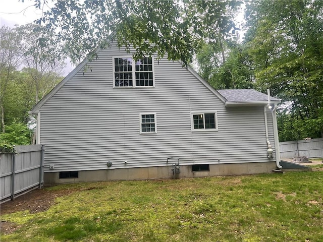 54 Polk Rd, Warwick, RI 02889 - view of home's exterior with roof with shingles