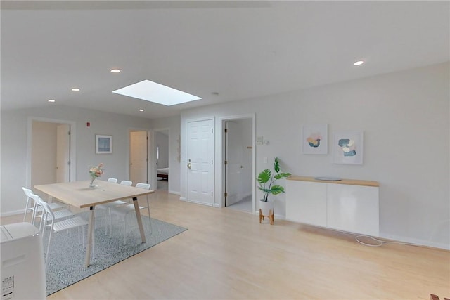 26 Cliff Ave Unit 4, Newport, RI 02840 - dining room featuring a skylight, wood finished floors, recessed lighting, and baseboards