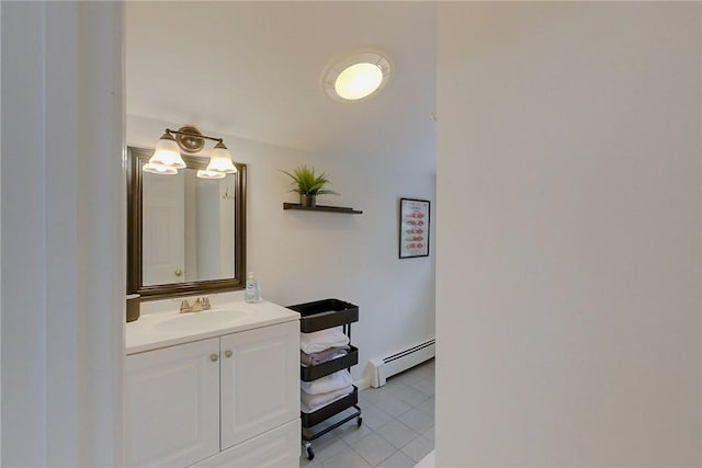 26 Cliff Ave Unit 4, Newport, RI 02840 - bathroom with baseboard heating, vanity, and tile patterned floors