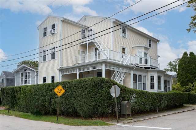 26 Cliff Ave Unit 4, Newport, RI 02840 - view of property exterior featuring stairway and a balcony