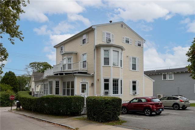 26 Cliff Ave Unit 4, Newport, RI 02840 - view of front facade featuring uncovered parking and a balcony
