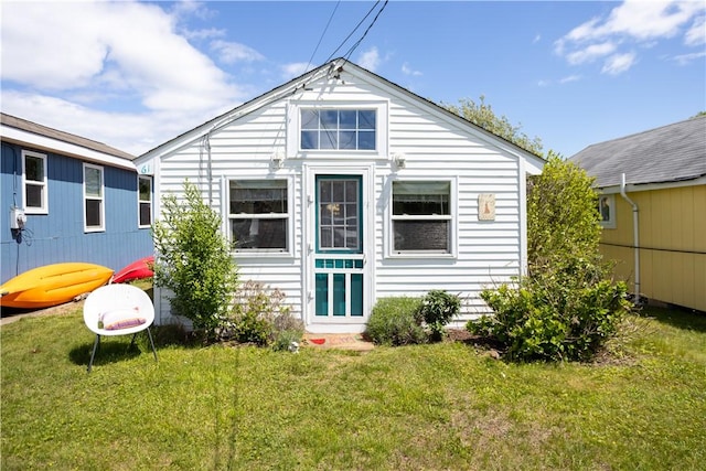 64 Burnside Ave, Narragansett, RI 02882 - back of house with a yard