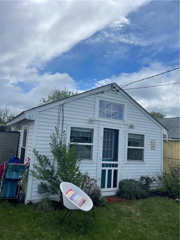 64 Burnside Ave, Narragansett, RI 02882 - rear view of property featuring a lawn