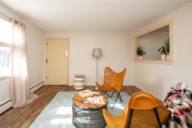 70 Carroll Ave Unit 510, Newport, RI 02840 - sitting room with wood finished floors and baseboard heating