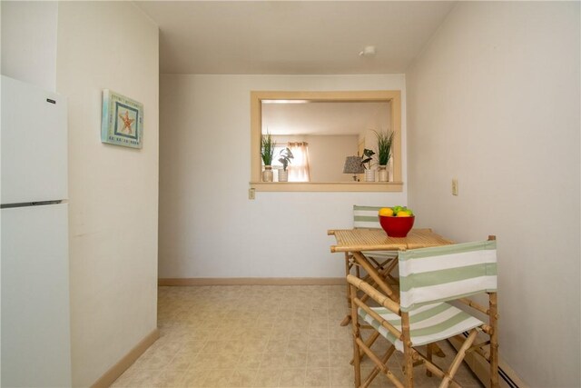 70 Carroll Ave Unit 510, Newport, RI 02840 - dining space with baseboards and tile patterned floors