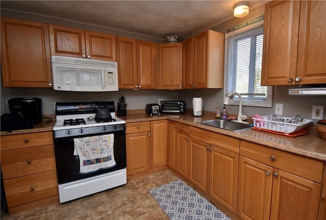 22 Sandy Ln, Westerly, RI 02891 - kitchen featuring white microwave, range with gas cooktop, a sink, and crown molding