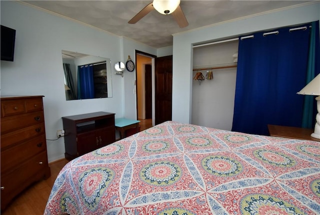 22 Sandy Ln, Westerly, RI 02891 - bedroom with wood finished floors, a closet, and a ceiling fan