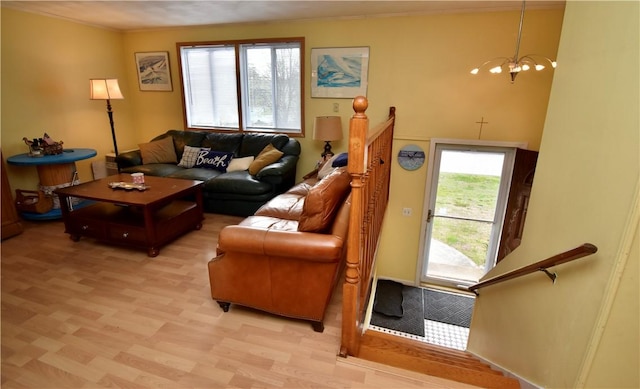 22 Sandy Ln, Westerly, RI 02891 - living room with a chandelier, light wood-type flooring, and ornamental molding