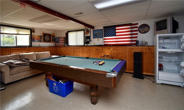 22 Sandy Ln, Westerly, RI 02891 - rec room featuring plenty of natural light, a drop ceiling, wainscoting, tile patterned floors, and wooden walls