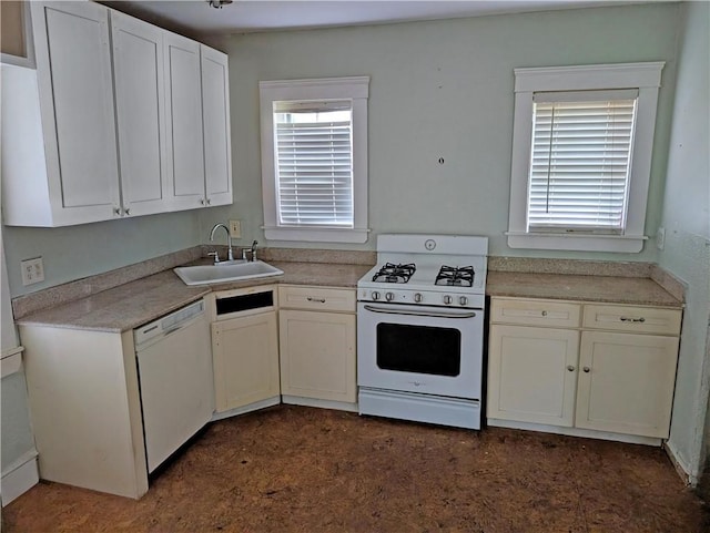 33 Zella St, Providence, RI 02908 - kitchen featuring white appliances, a sink, and white cabinets