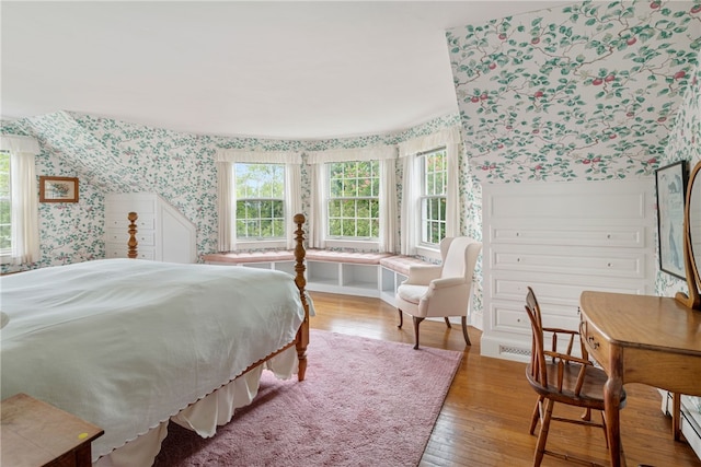 576 W Main Rd, Little Compton, RI 02837 - bedroom with wallpapered walls, multiple windows, and wood finished floors