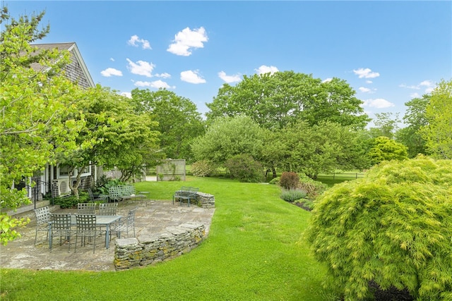 576 W Main Rd, Little Compton, RI 02837 - view of green lawn featuring a patio area