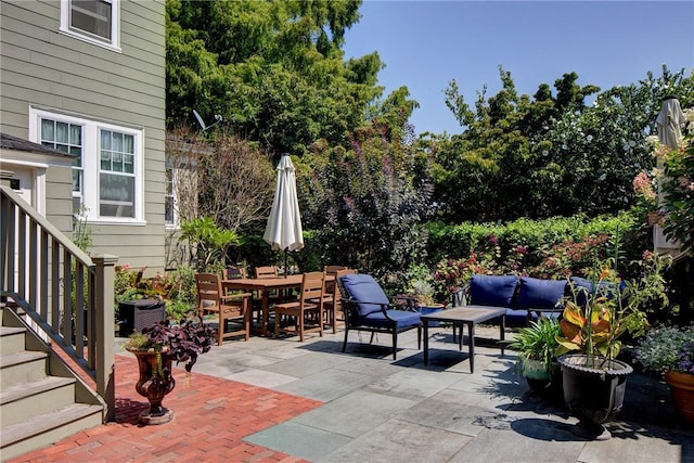 27 Cranston Ave, Newport, RI 02840 - view of patio / terrace featuring an outdoor living space, outdoor dining space, and stairway
