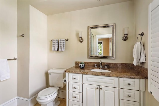 27 Cranston Ave, Newport, RI 02840 - bathroom featuring vanity, toilet, and baseboards