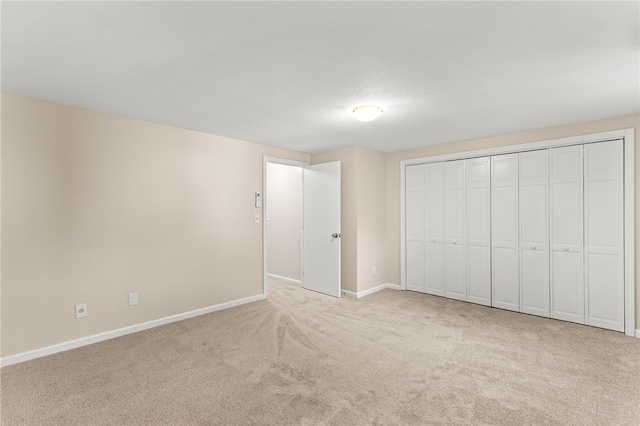 39 Exeter Blvd, Narragansett, RI 02882 - unfurnished bedroom featuring carpet floors, baseboards, and a closet