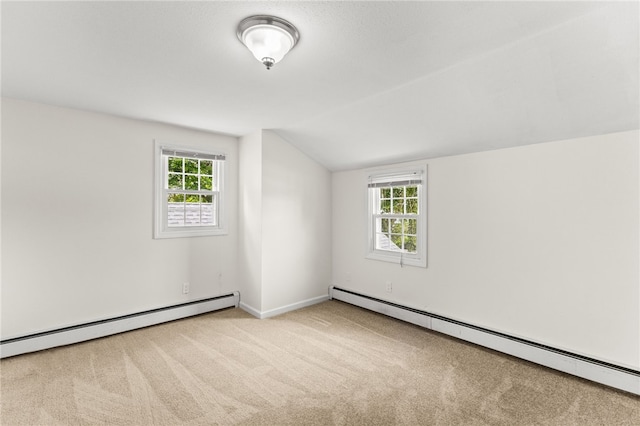 39 Exeter Blvd, Narragansett, RI 02882 - additional living space with baseboard heating, carpet, healthy amount of natural light, and vaulted ceiling
