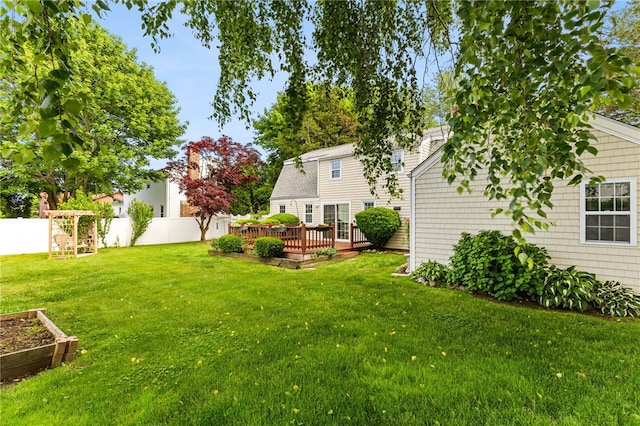39 Exeter Blvd, Narragansett, RI 02882 - view of yard with a wooden deck and a vegetable garden