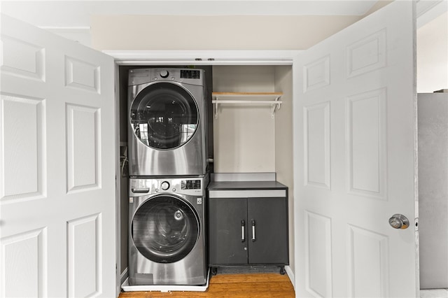 39 Exeter Blvd, Narragansett, RI 02882 - washroom with stacked washer / drying machine and wood finished floors
