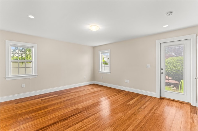 39 Exeter Blvd, Narragansett, RI 02882 - spare room featuring light wood-style floors, plenty of natural light, baseboards, and recessed lighting