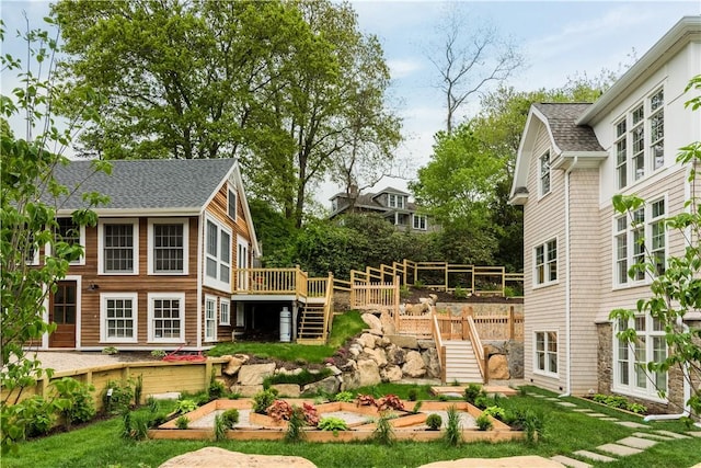 17 E Hills Rd, Westerly, RI 02891 - view of yard with stairs, a garden, and a deck