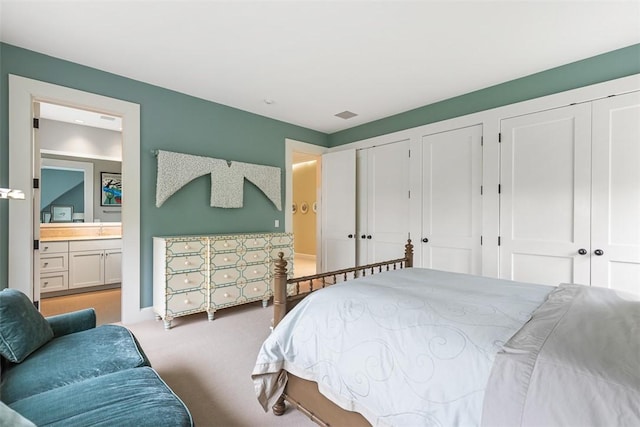 25 Walnut St, Jamestown, RI 02835 - bedroom featuring two closets, carpet floors, and ensuite bathroom