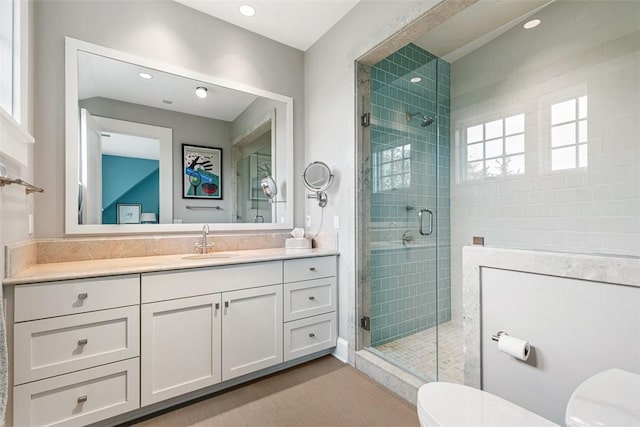 25 Walnut St, Jamestown, RI 02835 - full bathroom with toilet, vanity, a stall shower, and recessed lighting