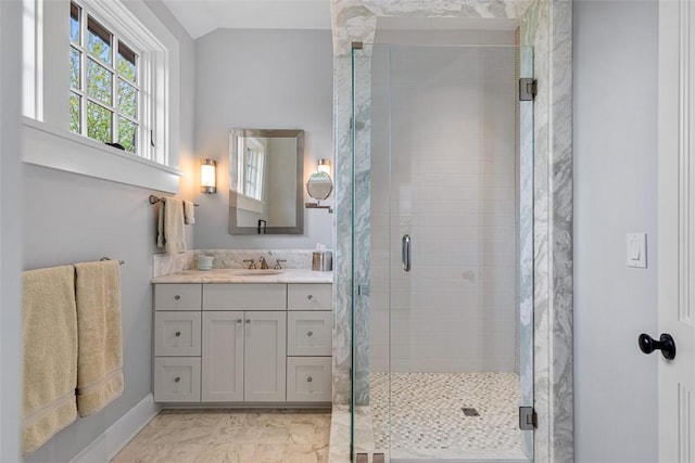 25 Walnut St, Jamestown, RI 02835 - full bathroom with vanity, a stall shower, vaulted ceiling, marble look tile flooring, and baseboards
