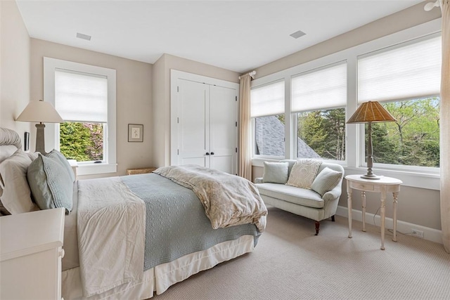 25 Walnut St, Jamestown, RI 02835 - carpeted bedroom with baseboards and a closet