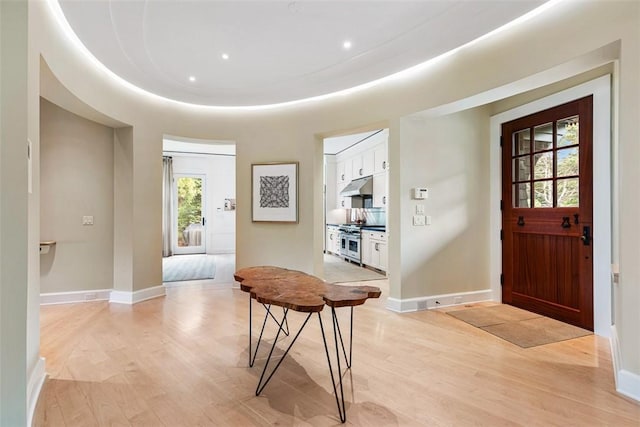 25 Walnut St, Jamestown, RI 02835 - entryway featuring light wood-style floors and baseboards