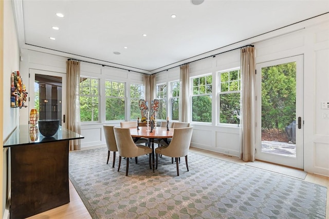 25 Walnut St, Jamestown, RI 02835 - dining space with light wood-style flooring, recessed lighting, and a decorative wall