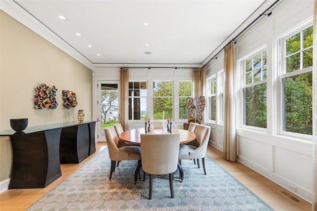 25 Walnut St, Jamestown, RI 02835 - dining space with plenty of natural light, light wood-type flooring, recessed lighting, and ornamental molding